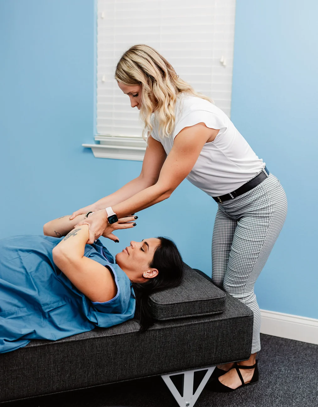 pregnant woman getting a chiropractic adjustment